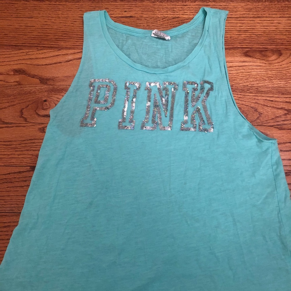 A blue, Victoria’s secret pink, tank top!